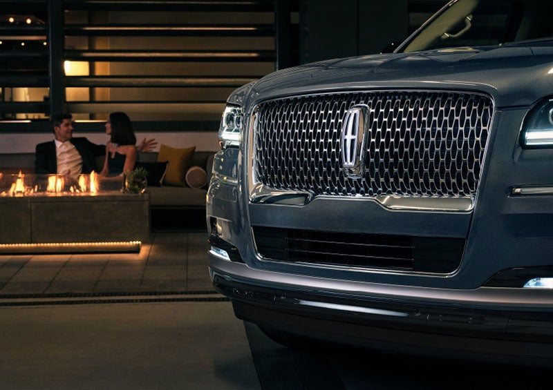 The front grille of a 2023 Lincoln Navigator® SUV is elegantly illuminated. | Ted Russell Lincoln in Knoxville TN