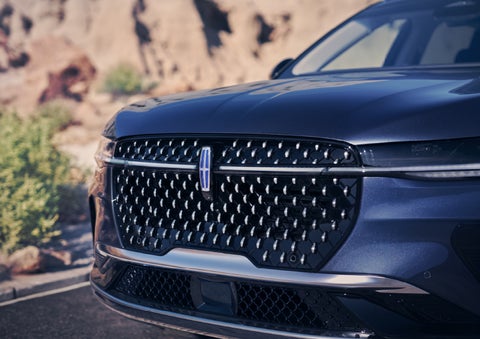 The stylish grille of a 2024 Lincoln Nautilus® SUV sparkles in the sunlight. | Ted Russell Lincoln in Knoxville TN